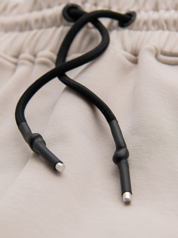 Ombre Clothing Muške trenirke s rebrastim manžetama i ukrasnim patentnim zatvaračem - pijesak Ombre Clothing