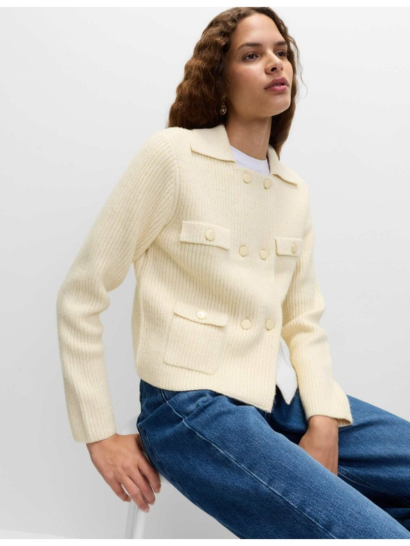 Marks & Spencer Pleteni prsluk s puhastim vlaknima i ukrasnim džepovima Marks & Spencer krem