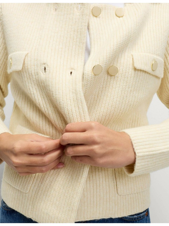 Marks & Spencer Pleteni prsluk s puhastim vlaknima i ukrasnim džepovima Marks & Spencer krem