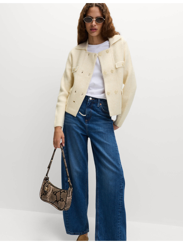 Marks & Spencer Pleteni prsluk s puhastim vlaknima i ukrasnim džepovima Marks & Spencer krem