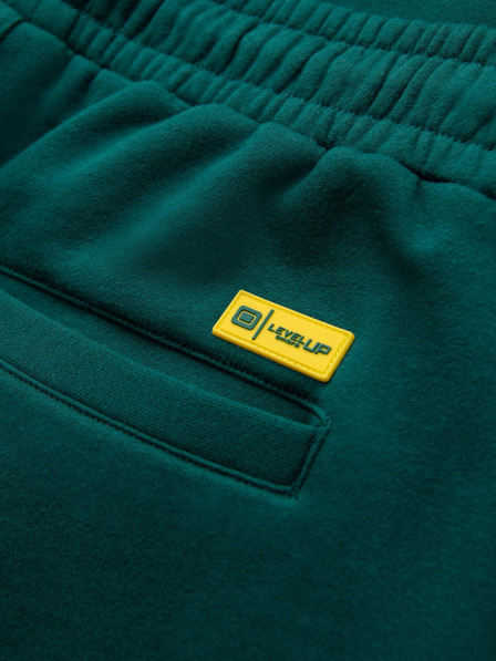 Ombre Clothing Klasične uniseks trenirke s rebrastim manžetama - tamno zelene V17 OU-PSBC-0100 Ombre Clothing