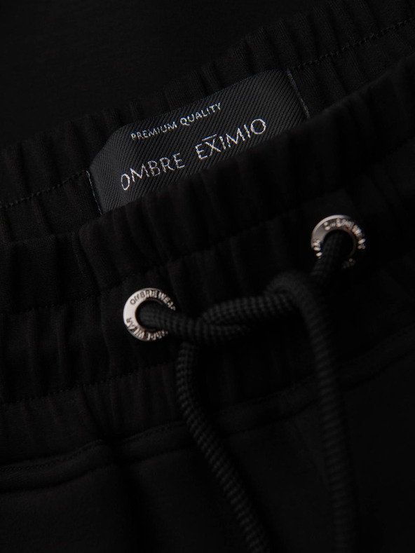 Ombre Clothing Muške trenirke s rebrastim nogavicama i gumenim printom - crne V1 OM-PASK-0223 Ombre Clothing