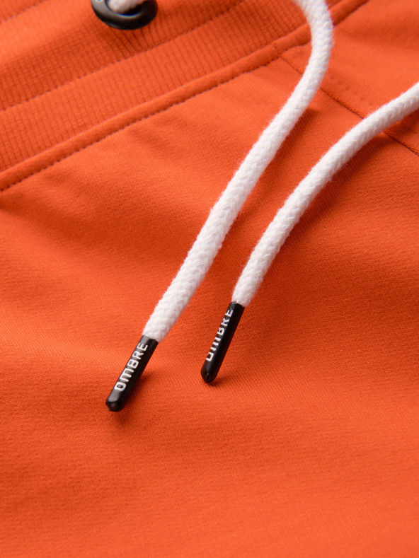 Ombre Clothing Narančaste muške trenirke Ombre Clothing