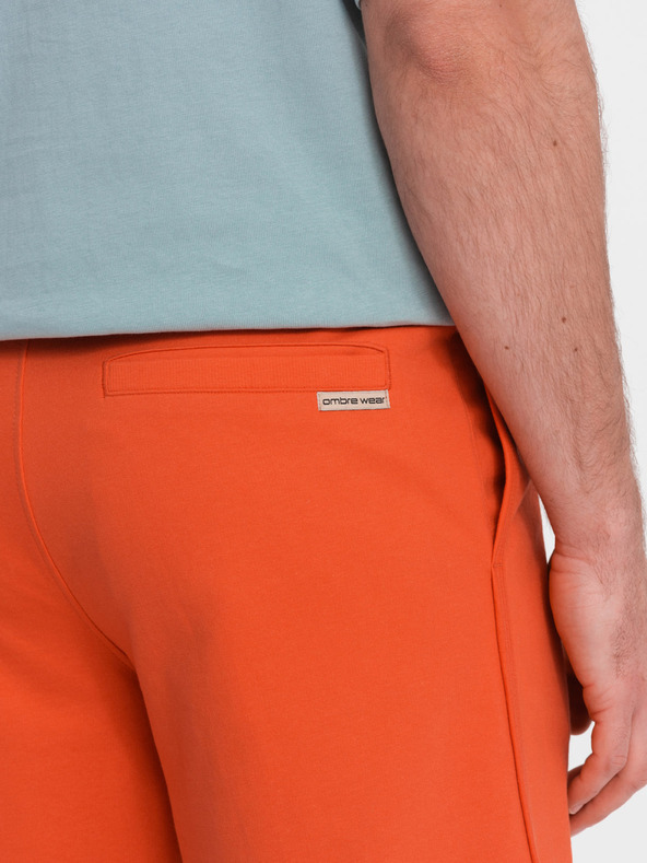 Ombre Clothing Narančaste muške trenirke Ombre Clothing