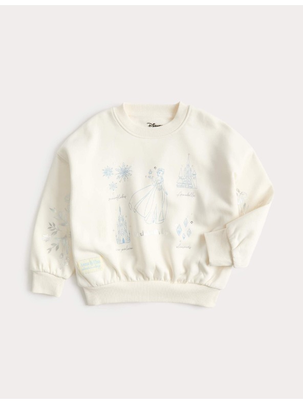 Marks & Spencer Dukserica s motivom Disney Ledeno kraljevstvo™ i visokim udjelom pamuka (2–8 godina) Marks & Spencer kremasta