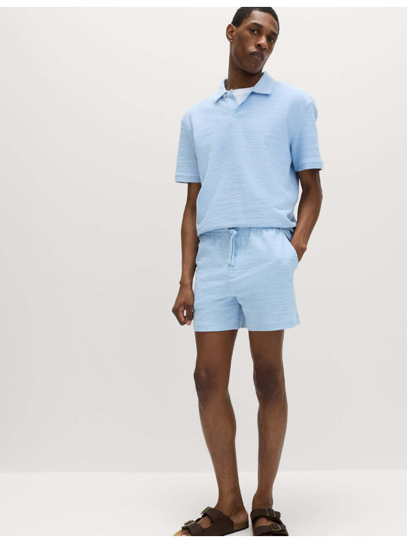 Marks & Spencer Buklé polo majica s klopama i urezima, s visokim udjelom pamuke Marks & Spencer plava