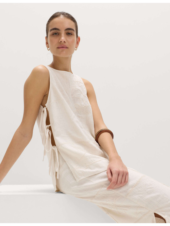 Marks & Spencer Prsluk s patchworkom, vezivanjem na boku i lanom Marks & Spencer krem